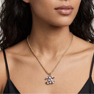 CHANEL EUC double C gold tone 
blue & clear rhinestone 
18” titanium gold rope